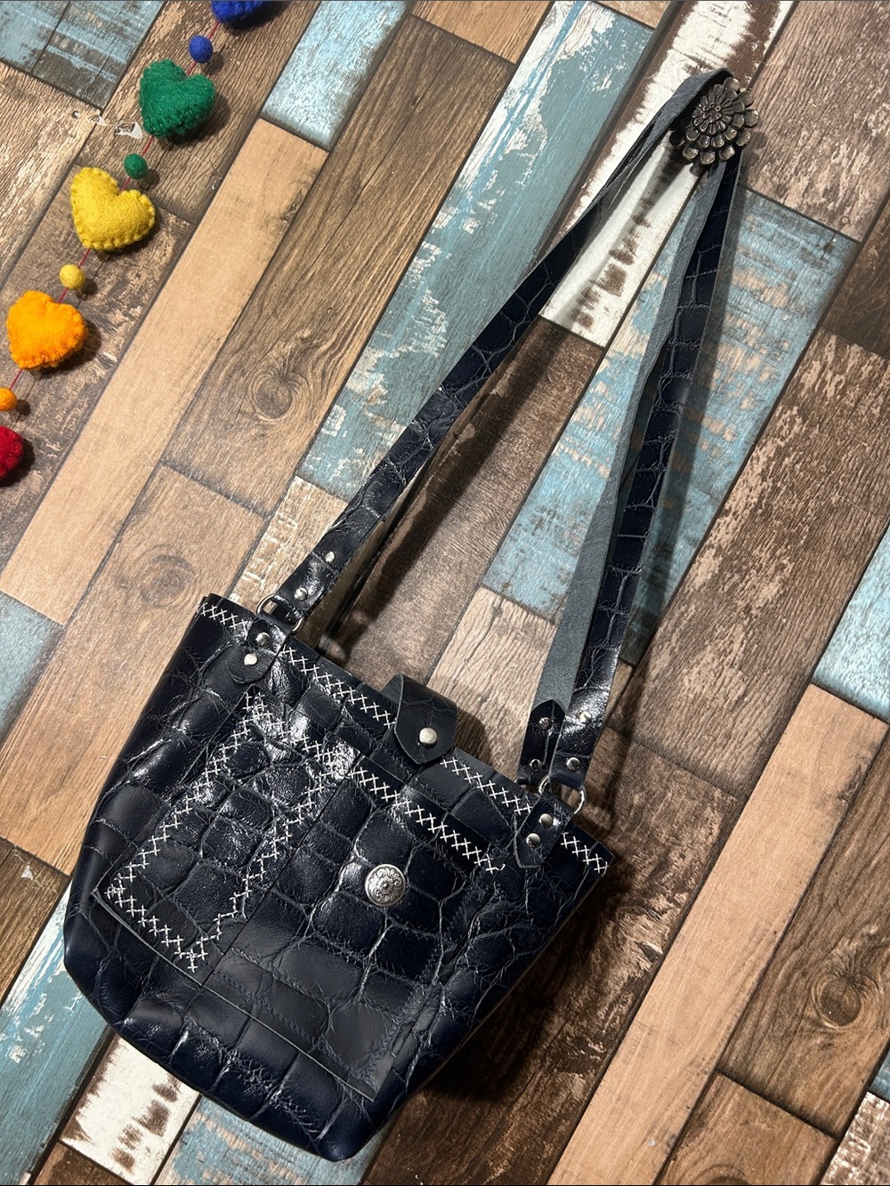 black tooled leather square purse